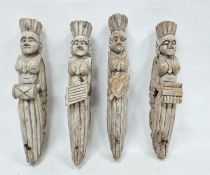 Set of four possibly 19th century carved wooden corbels of female form