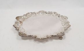 Early 20th century salver with scalloped edges, on three feet, Chester 1912, maker Baker Bros, 26ozt