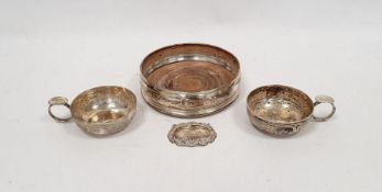 1970's silver-mounted wine coaster, London 1976, makers mark C&SLd, 13cm diameter, a pair of 1970'