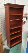 20th century mahogany open bookcase with moulded top above five shelves, on bracket feet, 190cm x