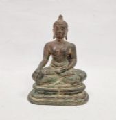 Bronze figure of seated Buddha, on stepped base, 20cm high