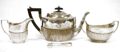 Early 20th century three-piece silver teaset comprising teapot, two-handled sugar bowl and milk jug,