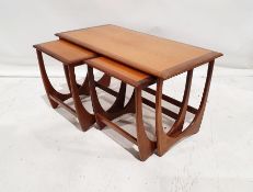 Mid 20th century G-Plan 'Astro' teak coffee table with two nesting tables, 50cm x 99cm x 50cm