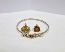 Collection of silver jewellery to include a Celtic-style tiger's eye bangle, gemstone pendant and