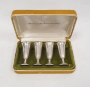 Cased set of four Gorham American sterling shot glasses, each 7cm high approx. and each 0.6ozt