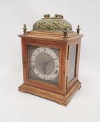 Early to mid 20thC bracket style clock. The gong striking movement by Garrard in three-glass case