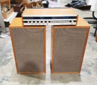 Vintage Tandberg TR-200 FM stereo receiver housed in teak case, serial no.1373139 and a pair of