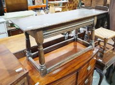 20th century oak coffee table, the rectangular top with moulded edge above turned block support,