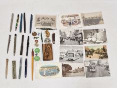 Quantity of assorted pens, etc to include gold-plated examples, a New Testament with olive wood