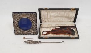 Victorian silver-handled button hook (marks worn), a Victorian silver-mounted repousse decorated