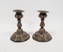 Pair of early 20th century German candlestick holders, marked C.W.Miller 800 Koblenz, each 12.5cm