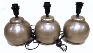 Three metal table lamps with hammered outer decoration (3)