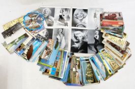 A quantity of 21st century used and unused postcards, U.K. and worldwide, with some larger cards and
