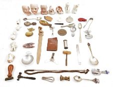 Quantity of mixed collectables to include dolls heads, rulers, caddy spoons, weights, seals, etc (