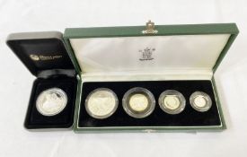 One 2003 silver Britannia coin set (4 coins), some toning and one 2013 Prince George Silver