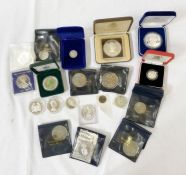 Tin box with a mixture of U.S. silver dollars commemorative issue world coins