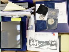 A large collection of Westminster commemorative medallions/coins representing Military. With