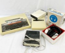 BBC microcomputer pioneer SE-30, stereo headphones, a microcomputer system teletext adapter, and