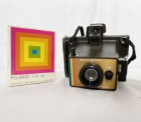 Polaroid colour Swinger Land camera with land film, boxed