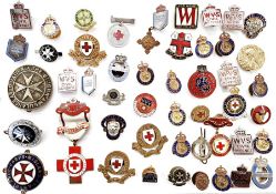 Collection of Silver Defence, Red Cross and St. John's Ambulance badges (1 box)
