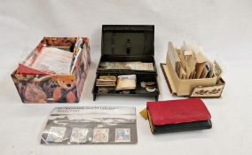 Assorted used stamps, empty stamp cases, purse of foreign coins, mixed coins and a silver locket (