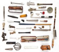 Assorted smoking related items to include bone cheroot holders, bakelite examples, plated