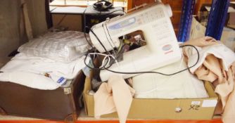 Janome electric sewing machine MC3500 and a quantity of textiles (2 boxes)