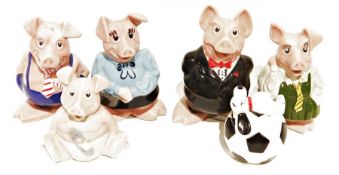 Five Nat West piggy banks and a Snoopy piggy bank (6)
