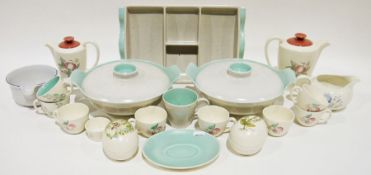 Quantity of Poole pottery to include part tea service, part coffee service, a freeform cream boat, a