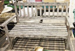 Wooden garden bench and two garden tables by RA Lister & Co Ltd, Gloucestershire (3)