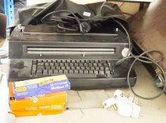 IBM 196C electric typewriter and a small quantity of ribbons and ribbon cassettes  Please note: Plug