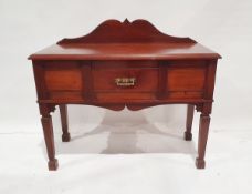 Mahogany sideboard having shaped raised back, single frieze drawer, flanked by pair panels, shaped
