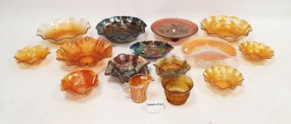 Quantity of carnival glass, a Murano-style cranberry coloured glass bowl with internal bubble