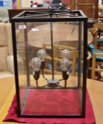 Modern black metal and glazed four-glass hanging lantern, 57cm high x 38cm wide