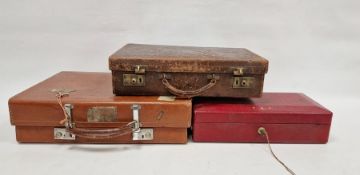 Red leather document case stamped 'TBP' with single brass carrying handle and two small leather
