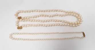Set of simulated graduating pearls on 9ct gold clasp and a set of two-string pearl necklace on