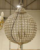 Modern circular crystal and pewter-effect electrolier