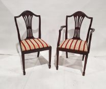 Mahogany D-end extending dining table, two carver armchairs, six standard chairs and two other