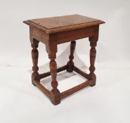 Antique oak joint stool on ring turned tapering supports, block feet and cross-stretchers, H. 47cm x