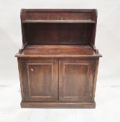 20th century oak kitchen dresser with galleried shelf above two panelled cupboard doors, on plinth
