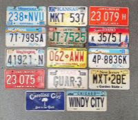 Small collection of US coloured metal car registration plates