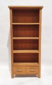 Modern beech open front bookcase, three shelves above two short drawers on square feet, H. 175cm x