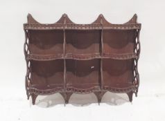 Victorian mahogany three-tier partitioned waterfall shelving unit with bowfronted galleried shelves,