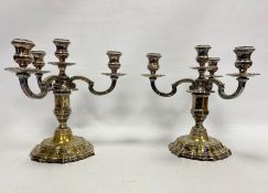 Pair of silver plated four-branch candelabra on shaped bases, 27cm high (2)