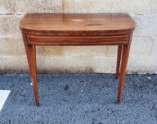 Edwardian mahogany satinwood inlaid card table on tapering supports, 92cm wide