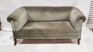 Chesterfield sofa, green upholstered, on turned supports and castors