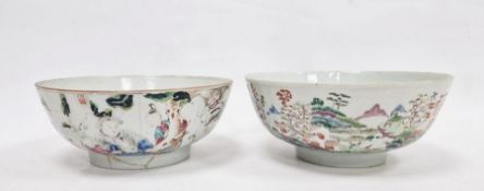 Two Chinese famille rose punchbowls, the first Qianlong, painted with figures in conversation in