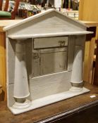 Distressed painted mirror in blue/grey, with pointed architectural top, pair of split pilasters,