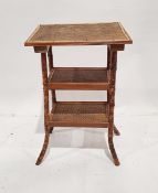 Bamboo and cane three-tier table, 47cm wide x 73cm high approx.