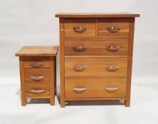 Modern oak chest of drawers with rectangular top over two short, three long drawers on square feet H